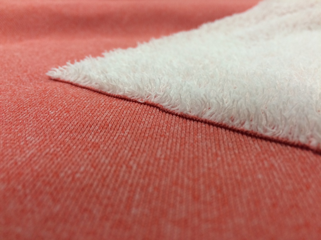 Polyester Warp Knit Offers Comfort Through Towel Like Pile Structure